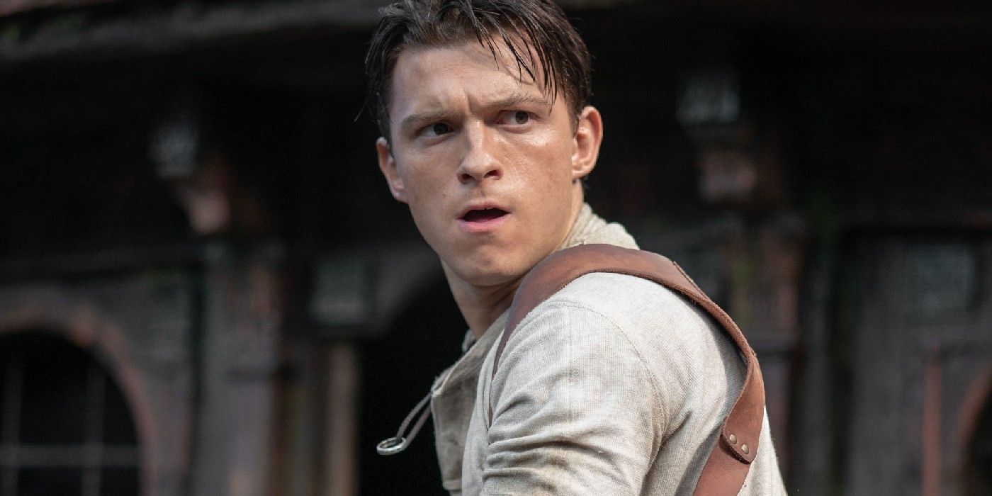 Tom Holland as Nathan Drake looking over his shoulder in Uncharted
