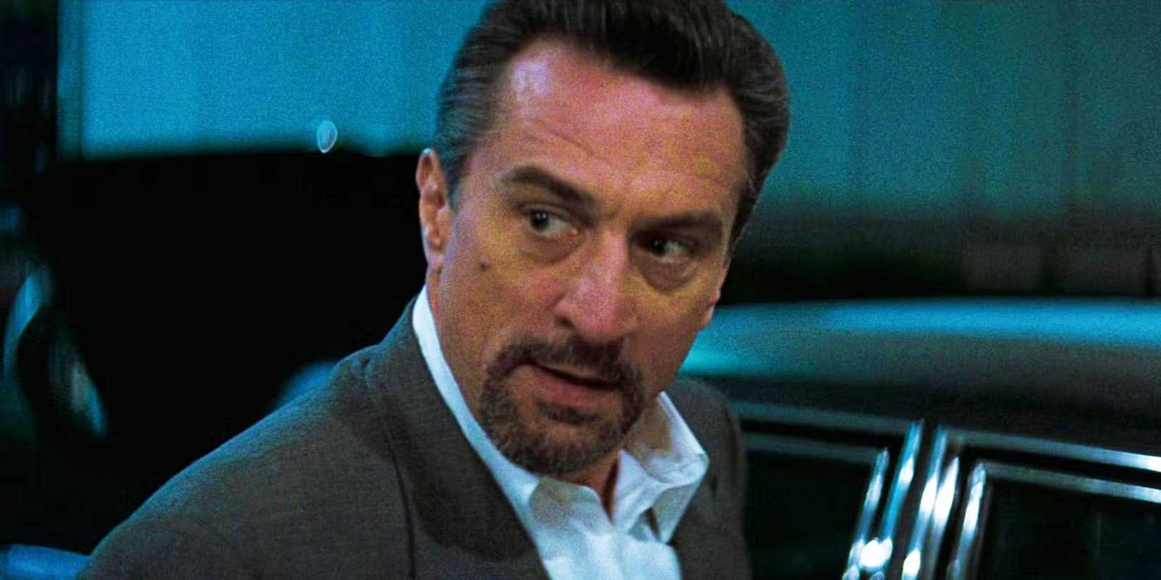 Robert De Niro as Neil McCauley looking over his shoulder in Heat