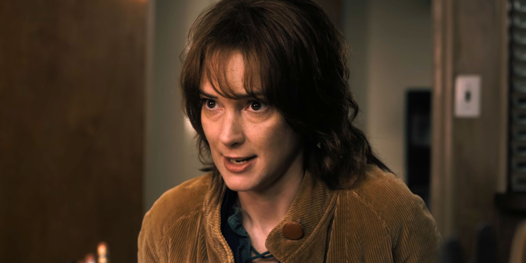 Winona Ryder as Joyce Byers looking intense in Stranger Things