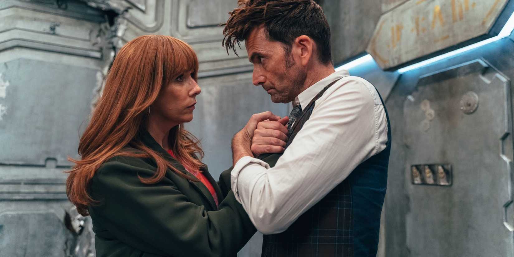 The Fourteenth Doctor and Donna clutching each other after the TARDIS abandons them on the ship in Doctor Who episode "Wild Blue Yonder."
