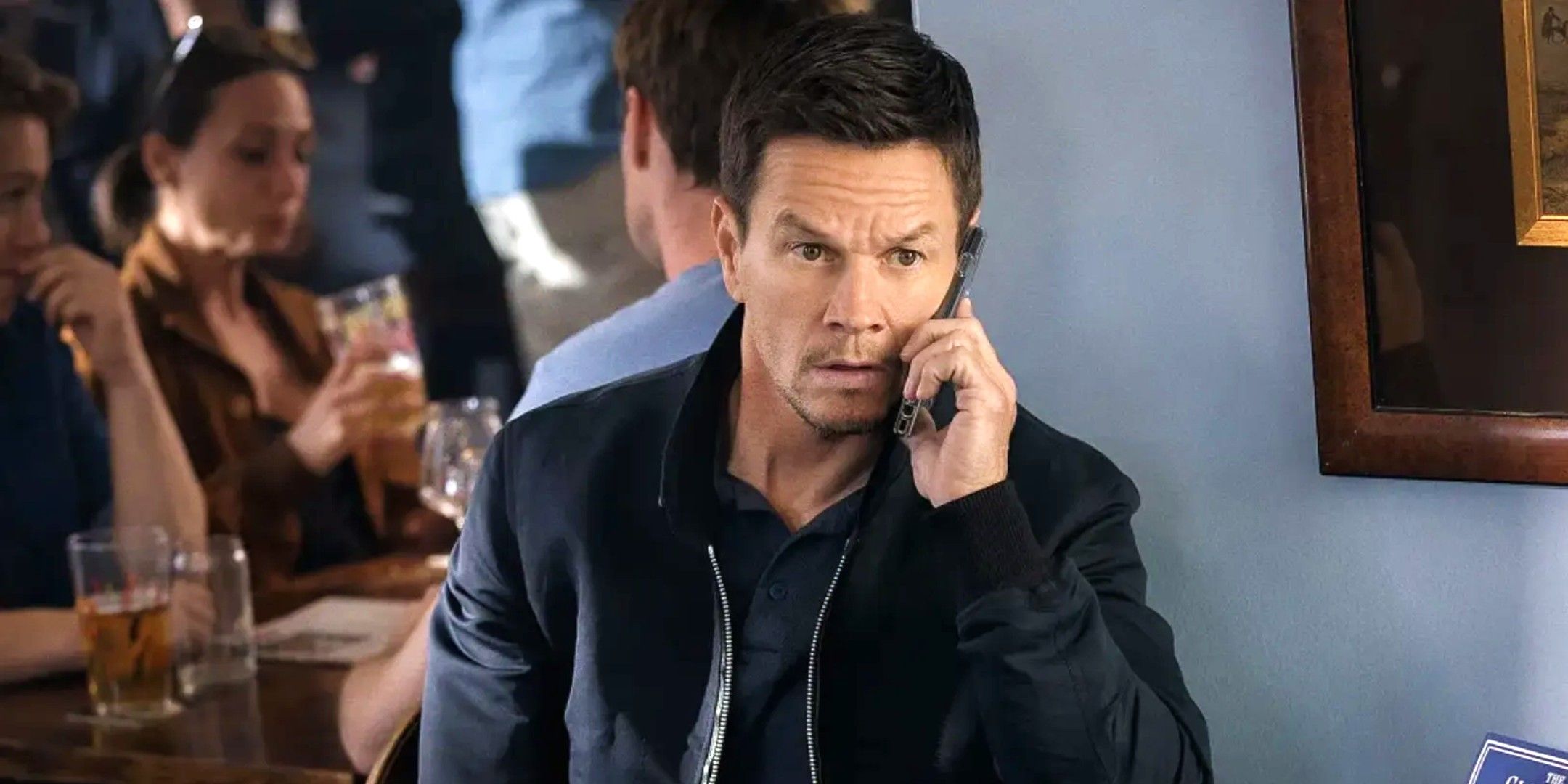 Mark Wahlberg on the phone in The Union