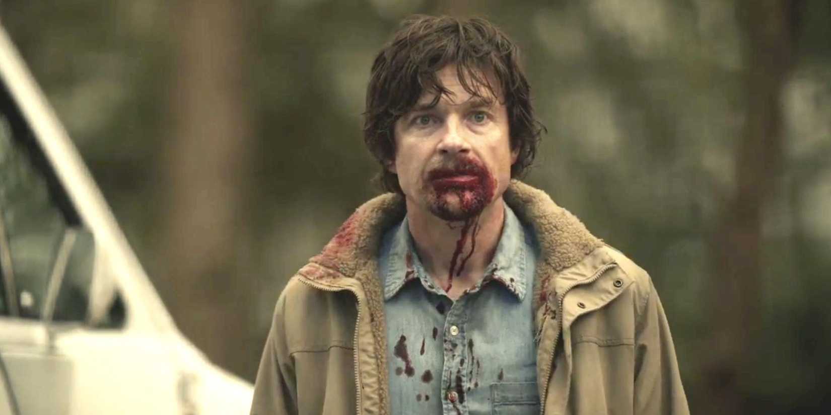 Jason Bateman with blood around his mouth in The Outsiders