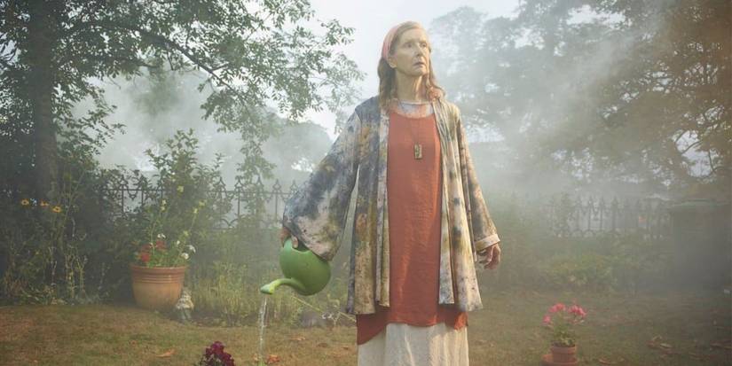 Nathalie Raven watering plants in The Mist TV series