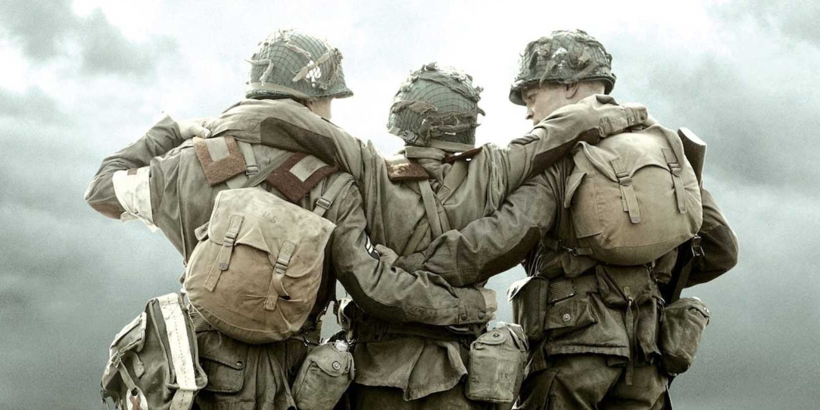 Three soldiers on Band of Brothers with their backs to the camera