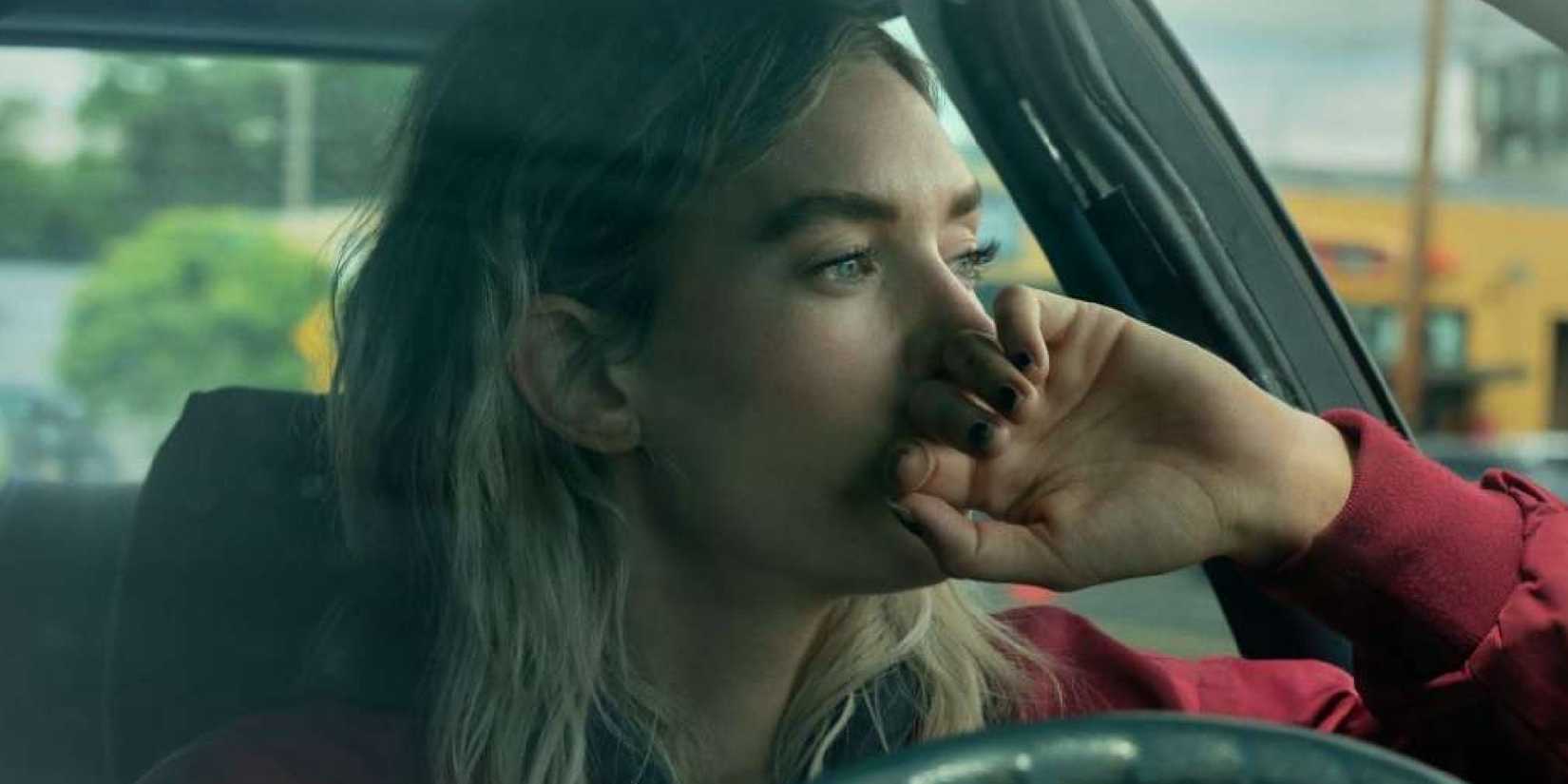 Vanessa Kirby drives her car in Night Always Comes