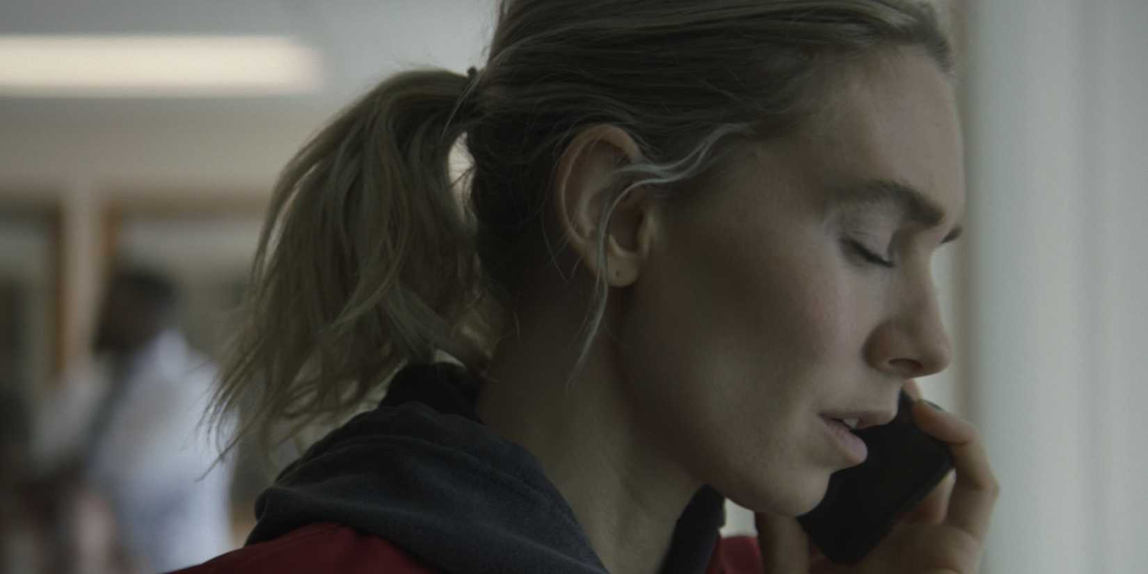 Vanessa Kirby talks on the phone in Night Always Comes