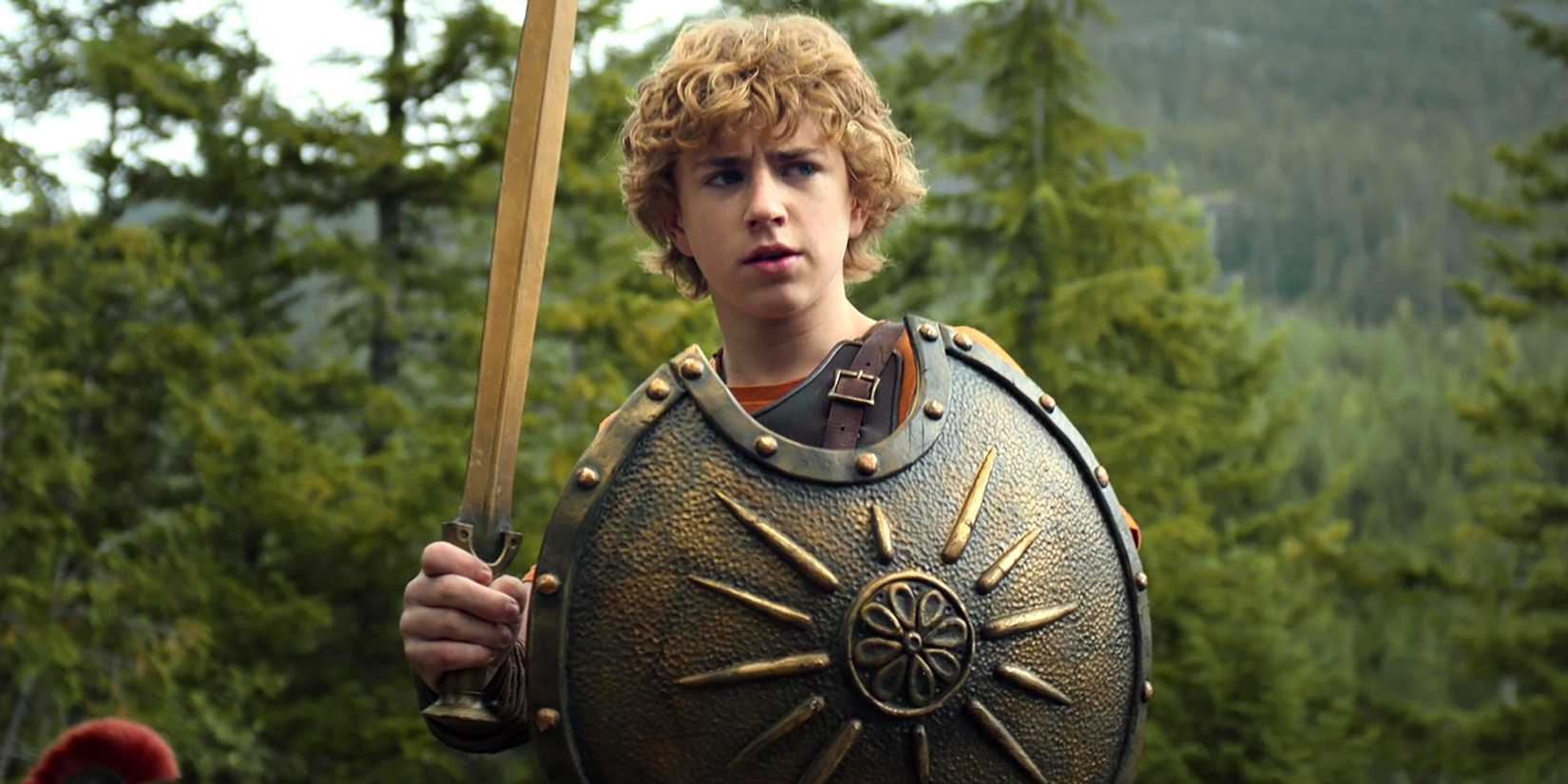 Walker Scobell's Percy wielding a sword and shied in Percy Jackson and the Olympians season 1
