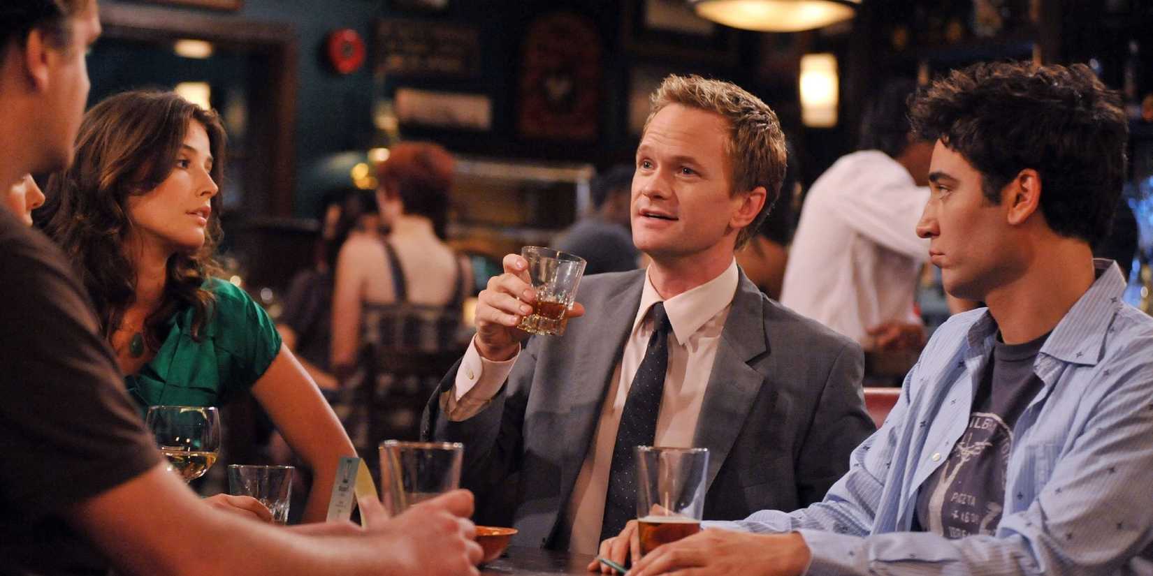 Barney, Ted, and Robin drinking at McClarens and talking to Lily and Marshall in How I Met Your Mother.
