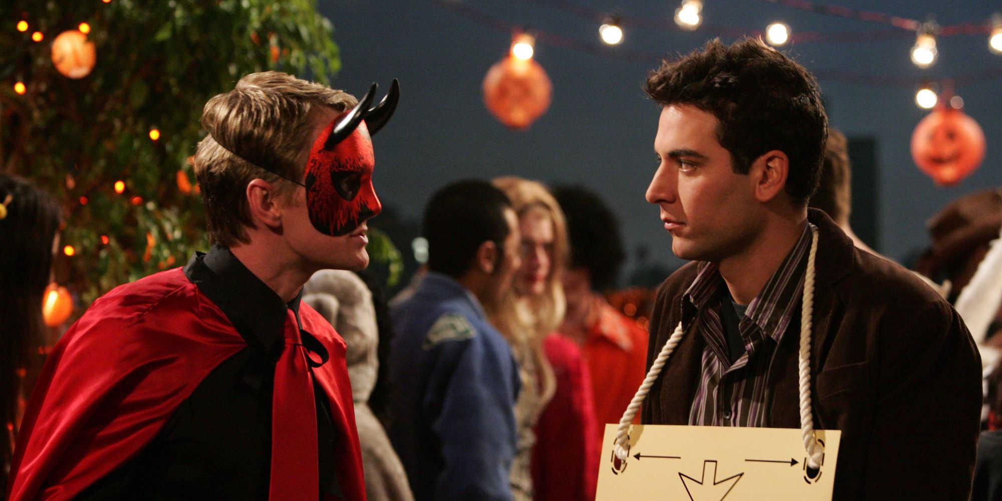 Ted, disguised as suspended Chad, and Barney, disguised as devil, during a Halloween party on the roof in the way I met your mother.