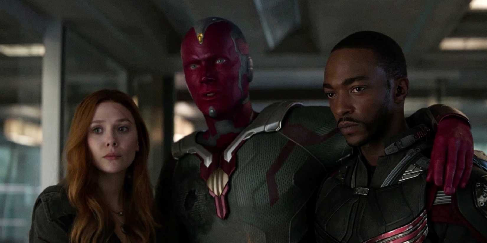 Wanda Maximoff and Sam Wilson help Vision in Avengers Infinity War