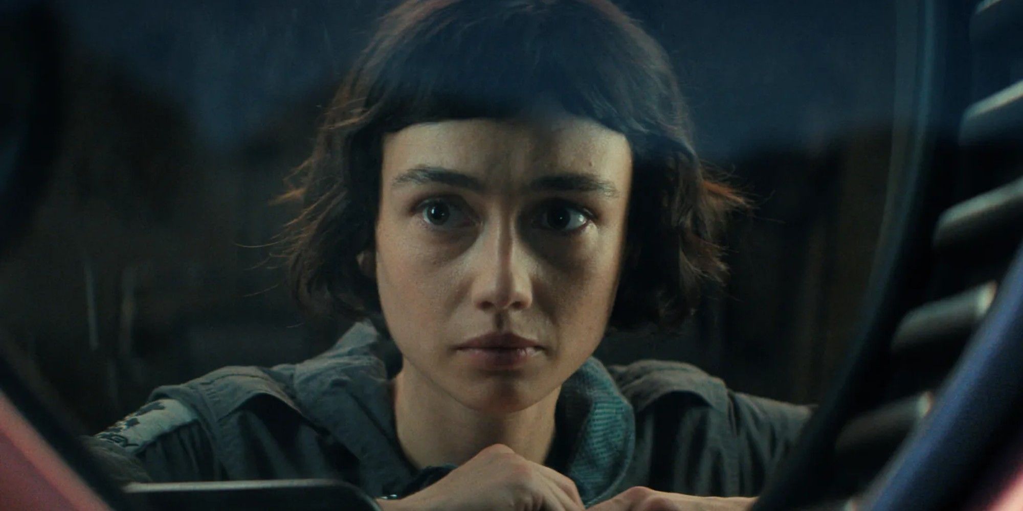 Wendy looks through the window of a ship in Alien_ Earth