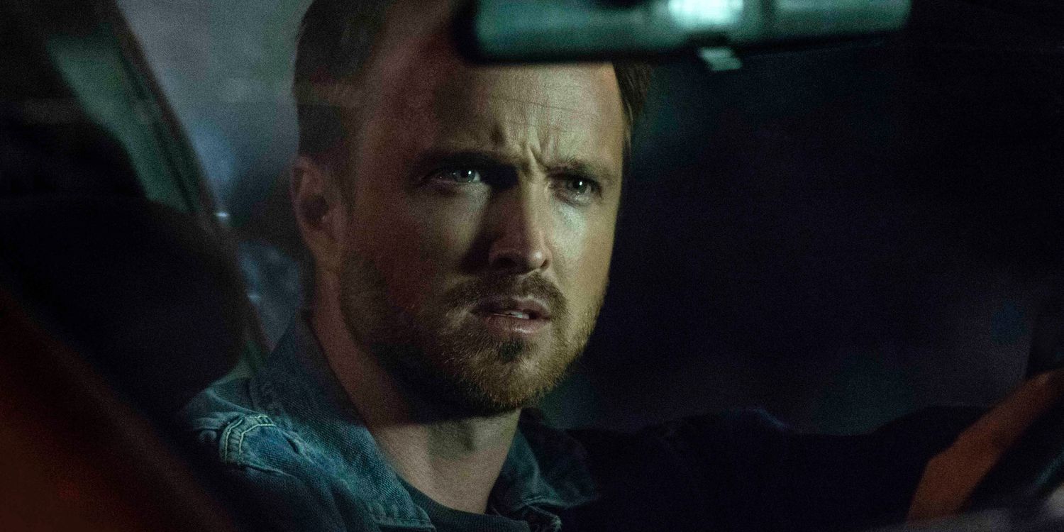 Aaron Paul looks on in The Path