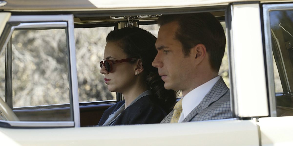 Agent Carter in a car with Edwin Jarvis.
