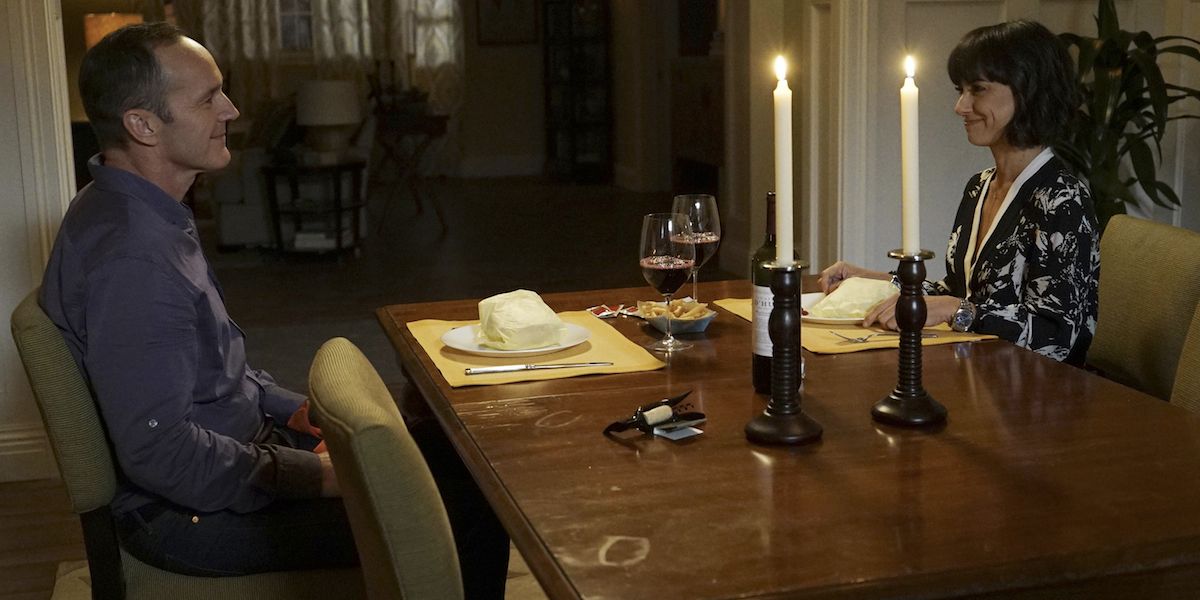 Coulson And Rosalind Sitting At A Table Having Dinner On Agents Of SHIELD