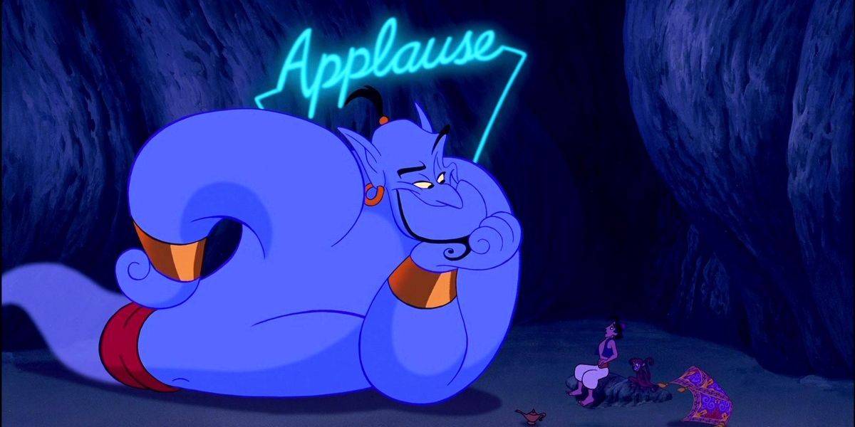 Genie with an applause sign in Aladdin