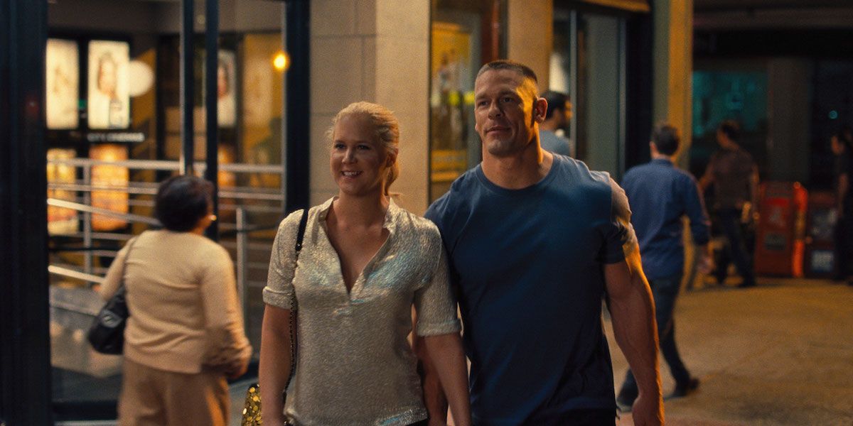 John Cena and Amy Schumer's characters walking in a street in Blockers