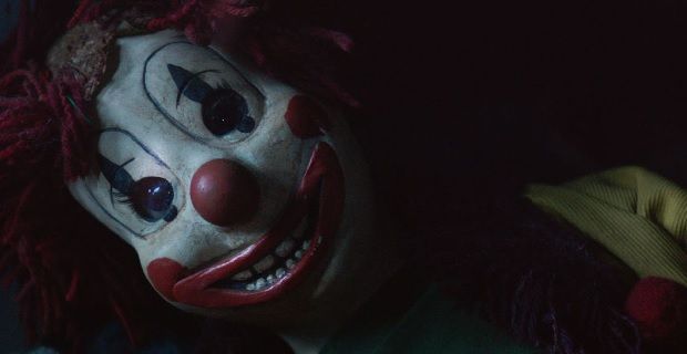 An evil clown doll in Poltergeist