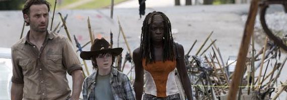 Andrew Lincoln Chandler Riggs and Danai Gurira in The Walking Dead Clear