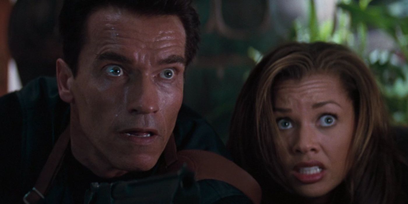 Arnold Schwarzenegger and Vanessa Williams looking scared in Eraser
