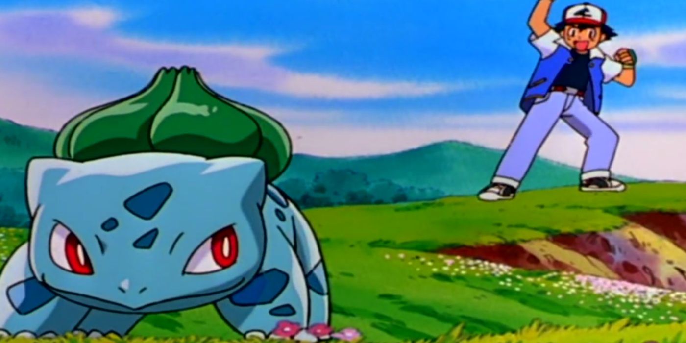 On a grassy field, Bulbasaur looks over its shoulder while Ash Ketchum cheers it on from behind in Pokemon.