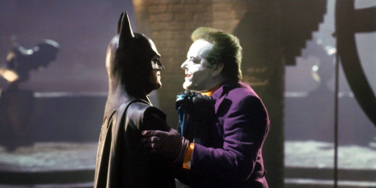 Batman holding up the joker in Batman 1989