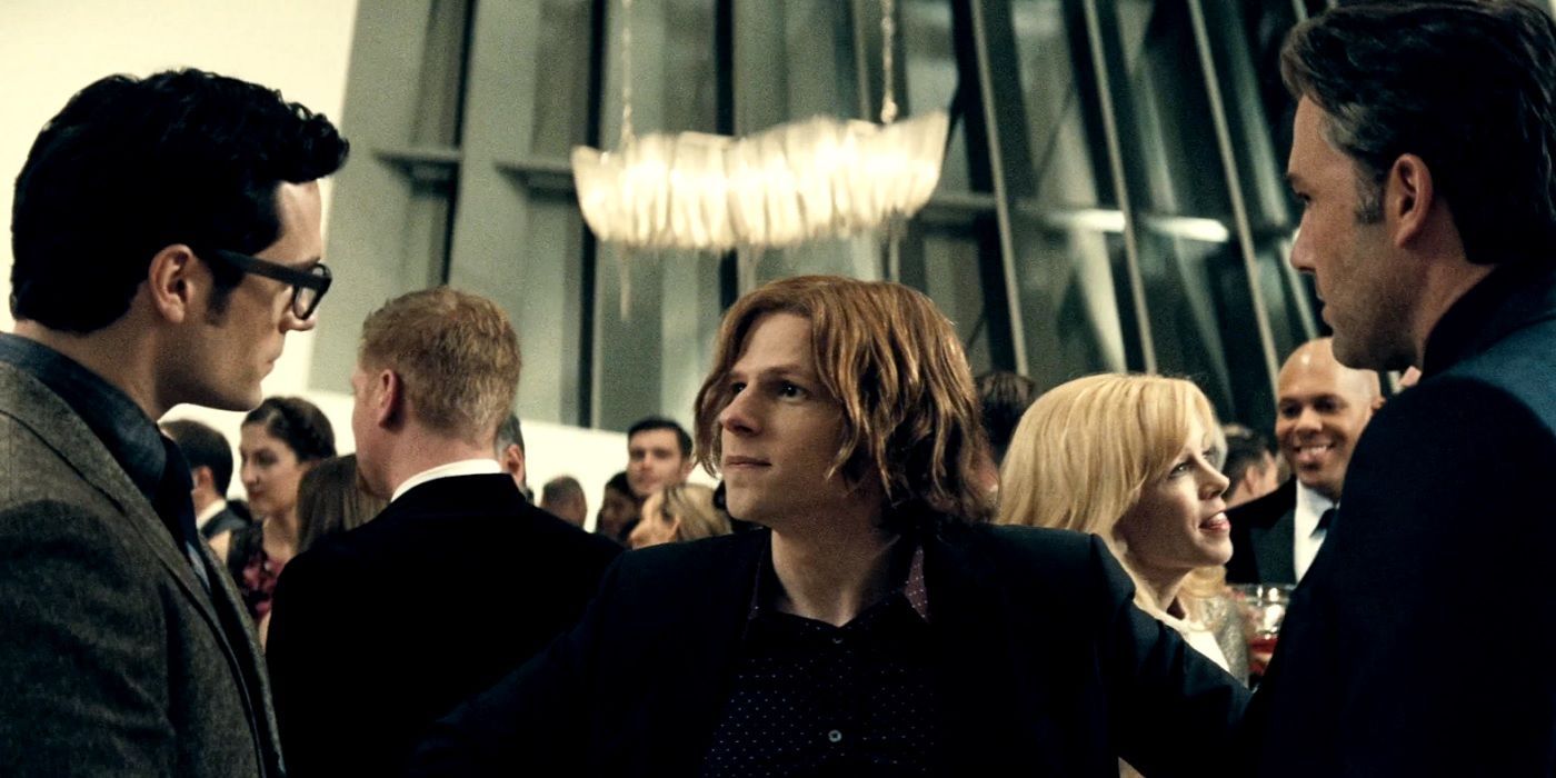 Clark Kent and Bruce Wayne meeting at Lex Luthor's party in Batman v Superman
