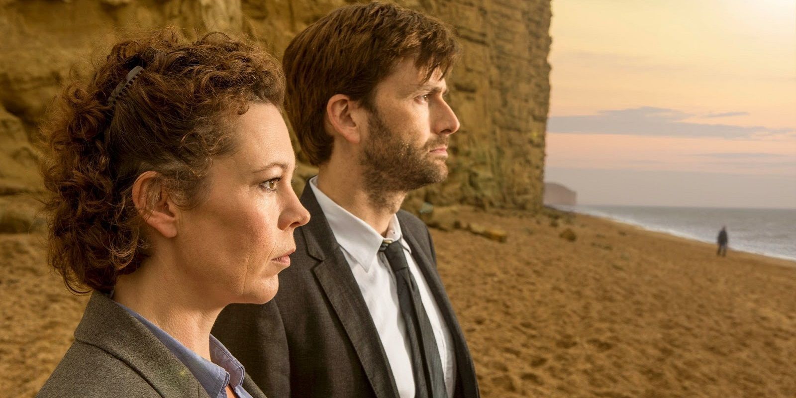 David Tennant and Olivia Colman looking off into the ocean in Broadchurch