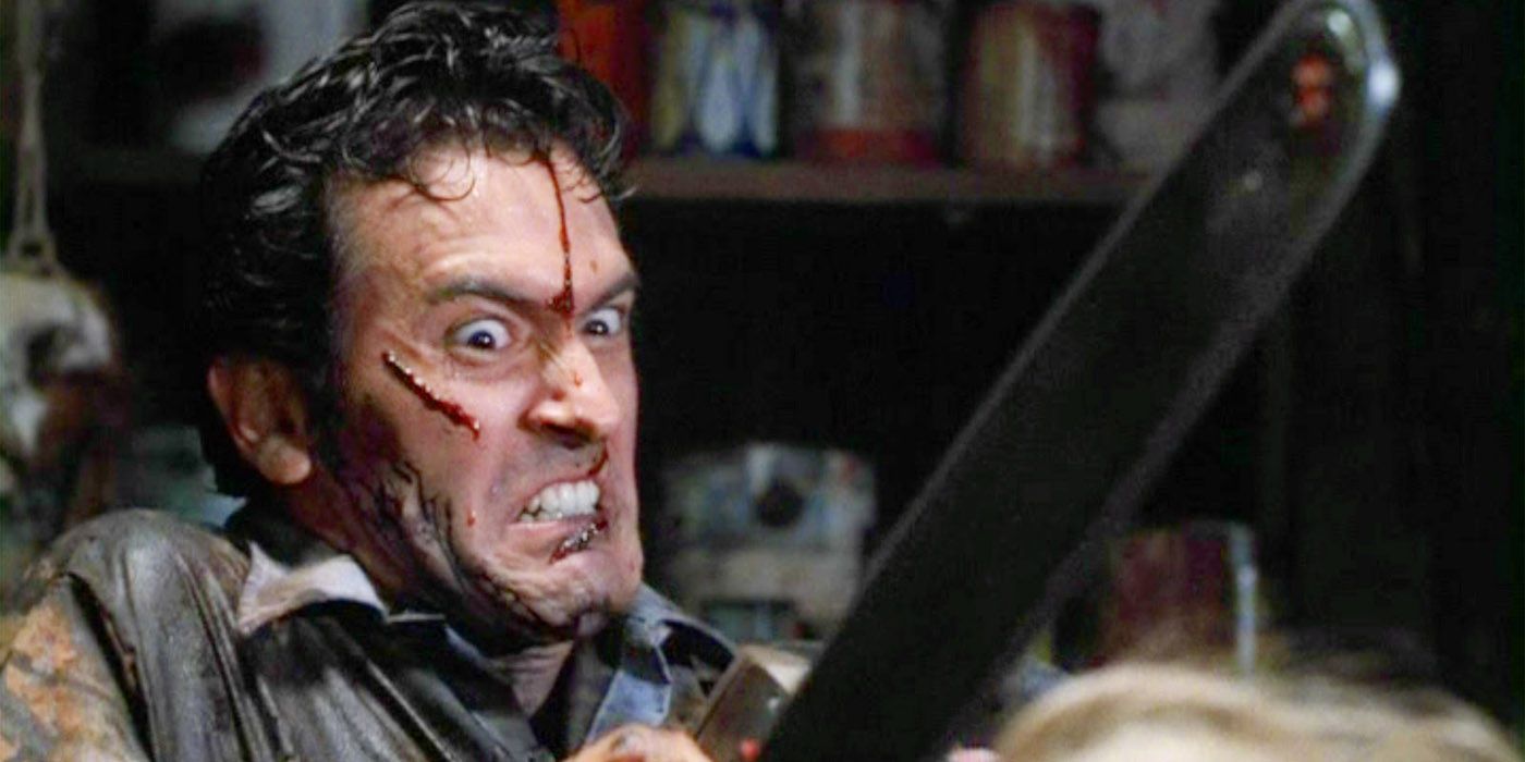 Bruce Campbell as Ash Williams brandishing a chainsaw in The Evil Dead II