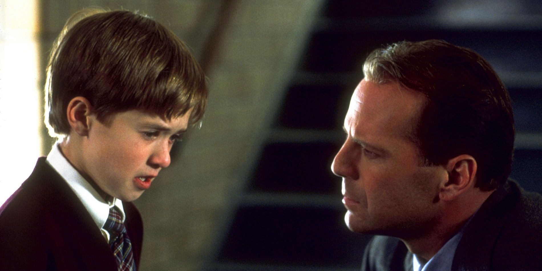 Bruce Willis and Haley Joel Osment as a child in The Sixth Sense