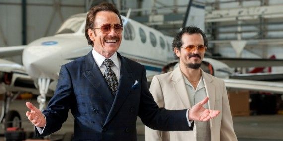 Bryan Cranston and John Leguizamo in front of a private jet in The Infiltrator