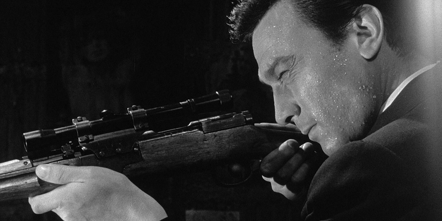 An assassin aiming a rifle in The Manchurian Candidate