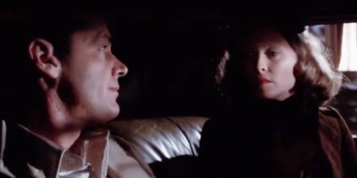 Jake and Evelyn look at each other in the dark in Chinatown
