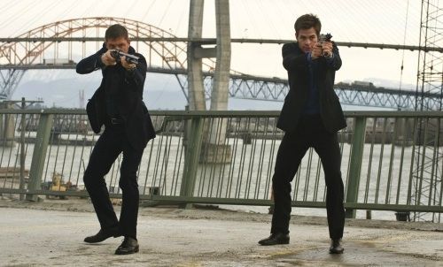Tom Hardy and Chris Pine taking aim in 'This Means War'