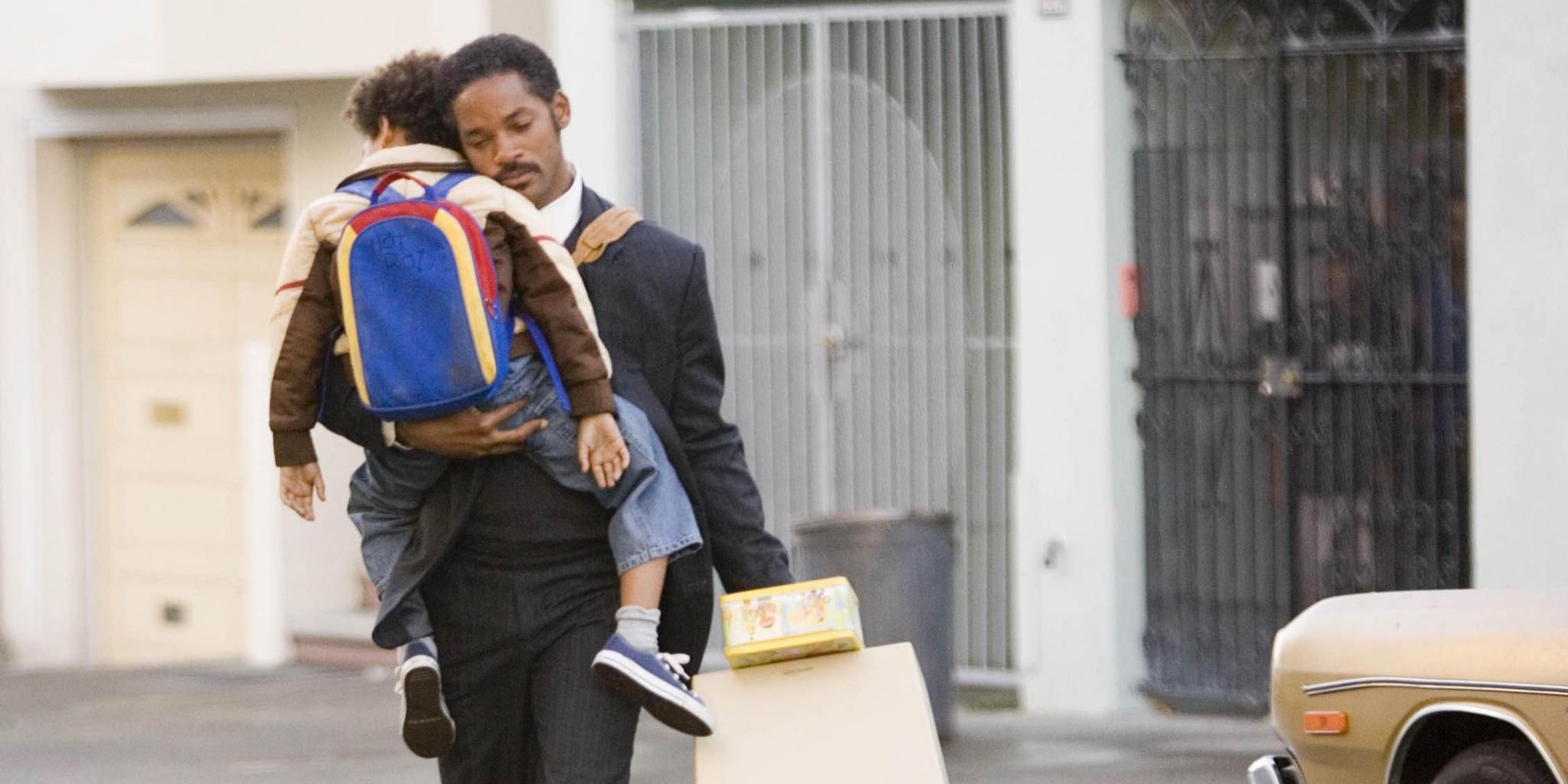 Chris and his son cross the street in Pursuit of Happyness