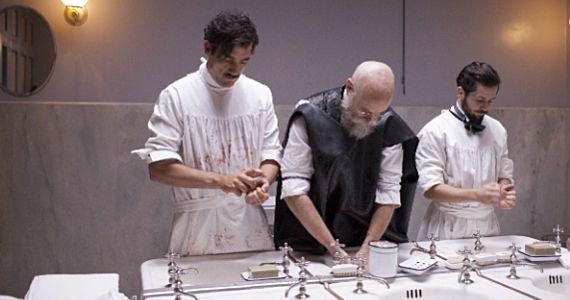 Clive Owen Matt Frewer and Michael Angarano in The Knick season 1 episode 1