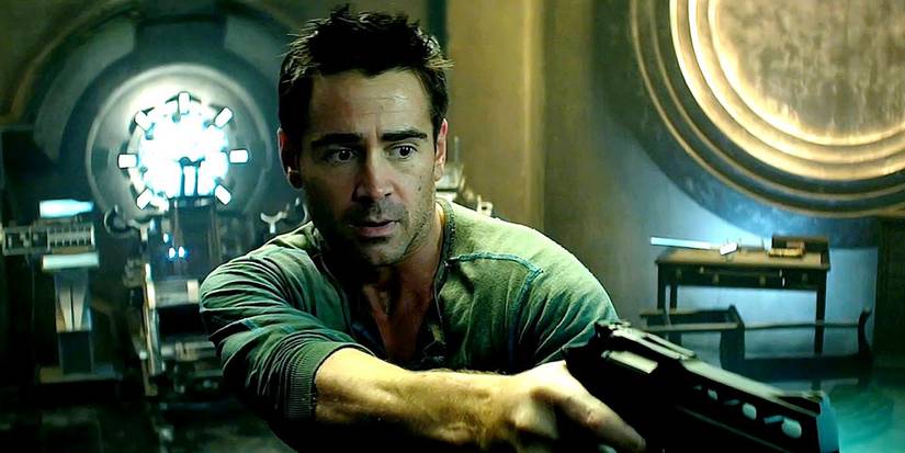 Colin Farrell holding a gun in Total Recall