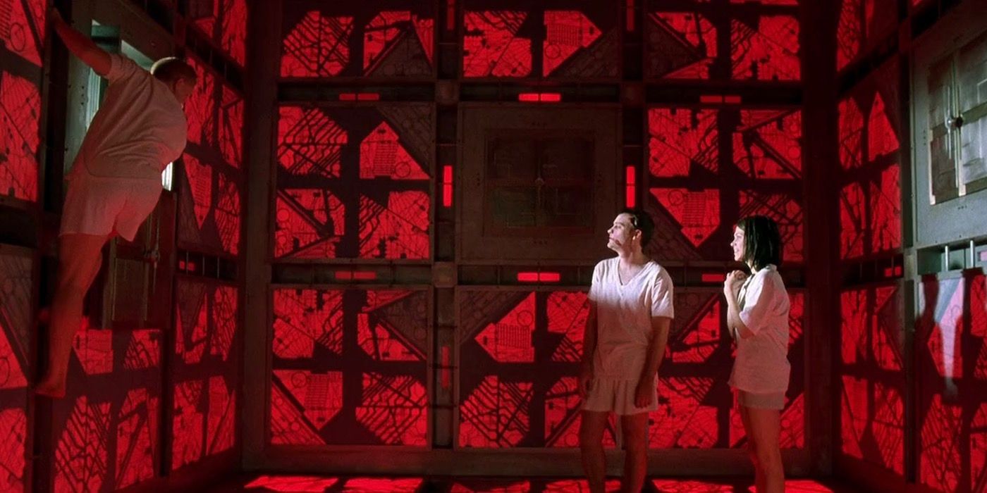 Two characters inside a red room in Cube