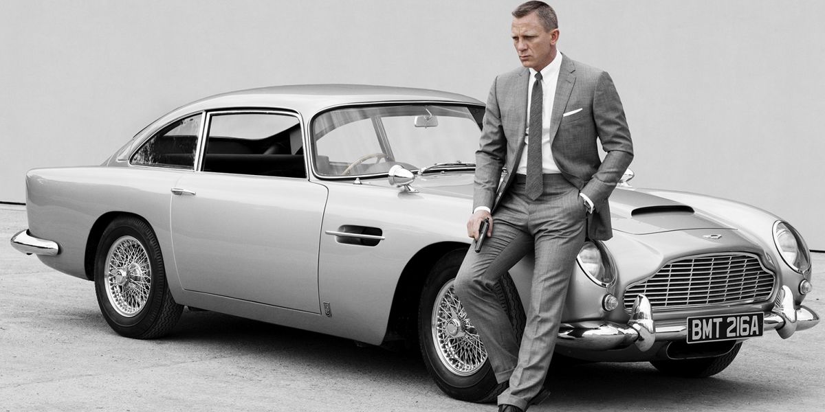 Daniel Craig as James Bond with Aston Martin