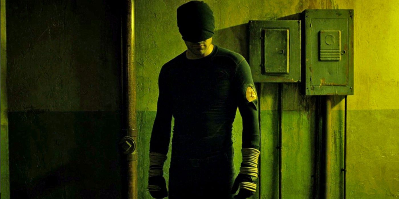 Matt Murdock wearing a black mask in a hallway in Daredevil.