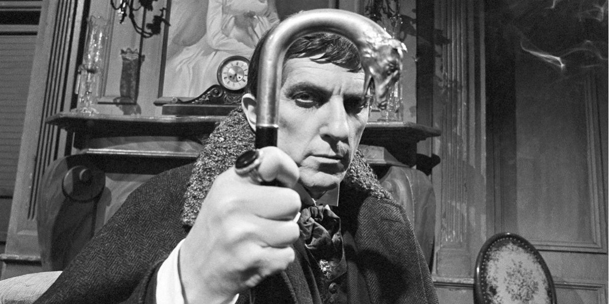 Barnabas Collins peers through his cane in Dark Shadows