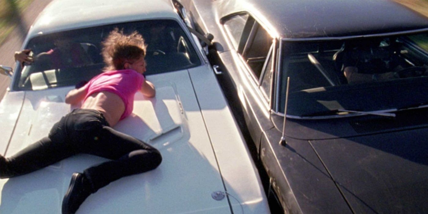 Zoe Bell hanging from the hood in the car chase in Death Proof