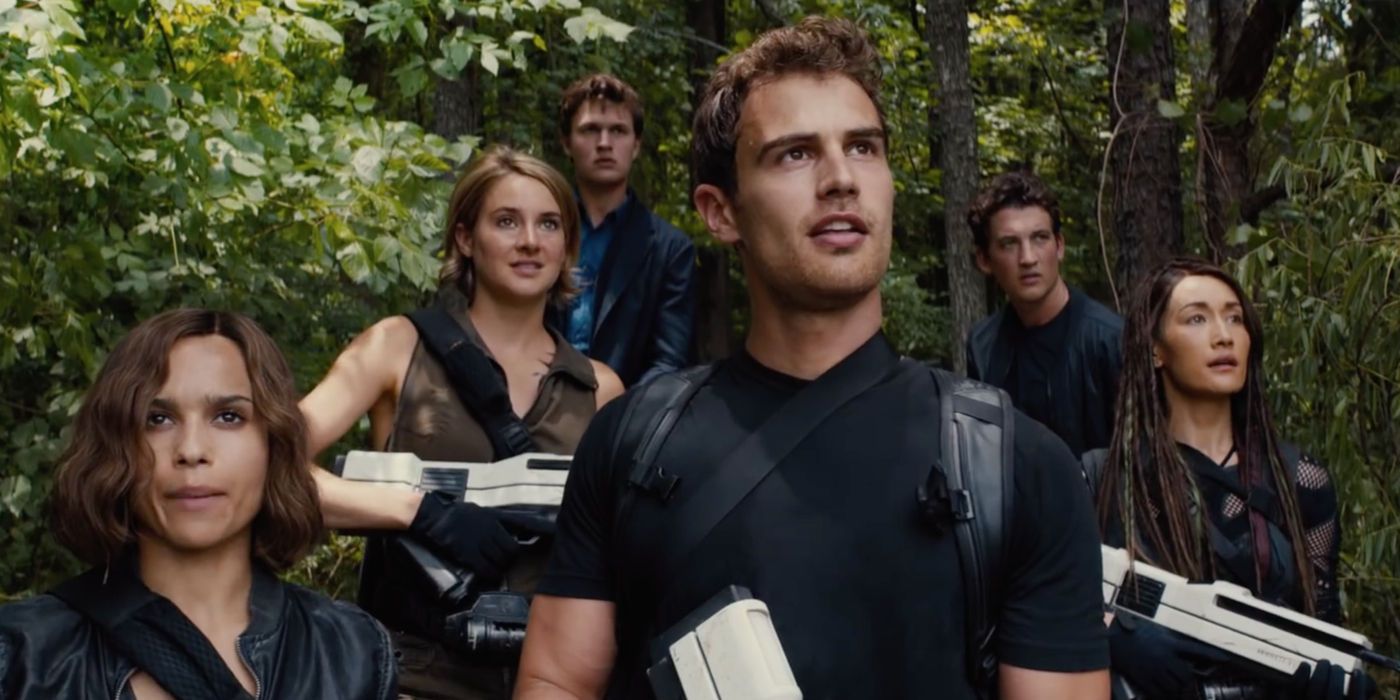 The Cast of Divergent Series: Allegiant with Guns in the Woods