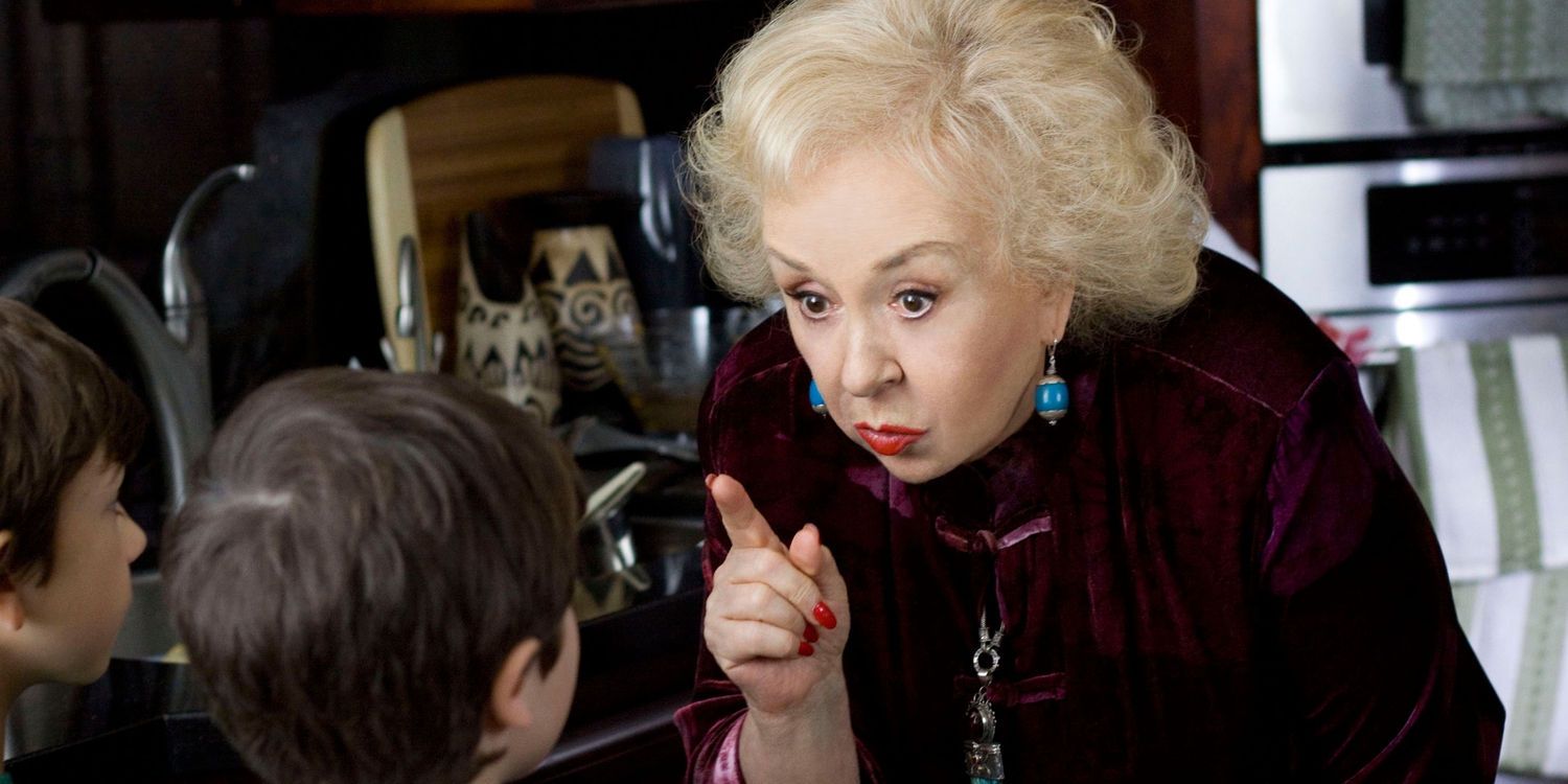 Doris Roberts in Mrs. Miracle pointing a finger at a child