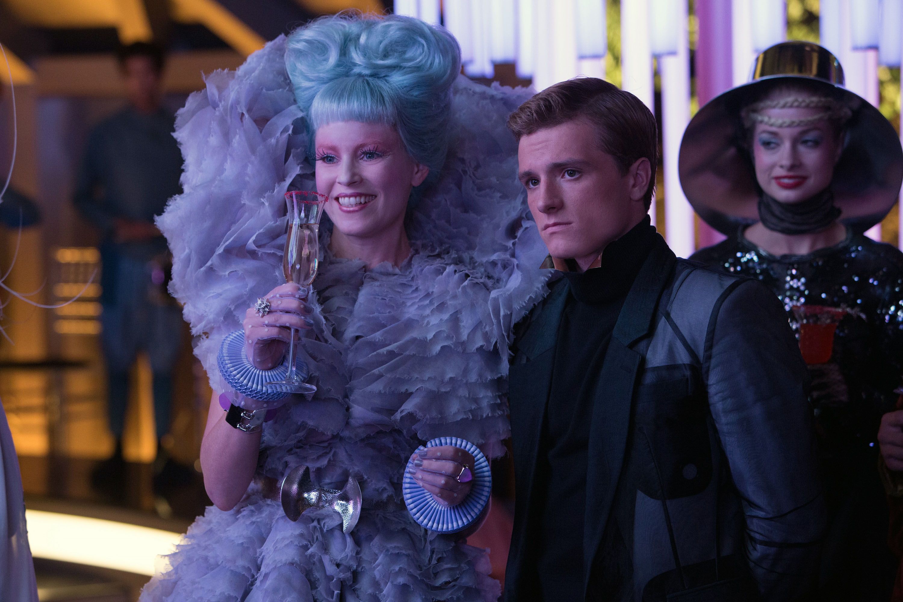 Effie Trinket (Elizabeth Banks) and Peeta (Josh Hutcherson) in Hunger Games: Catching Fire