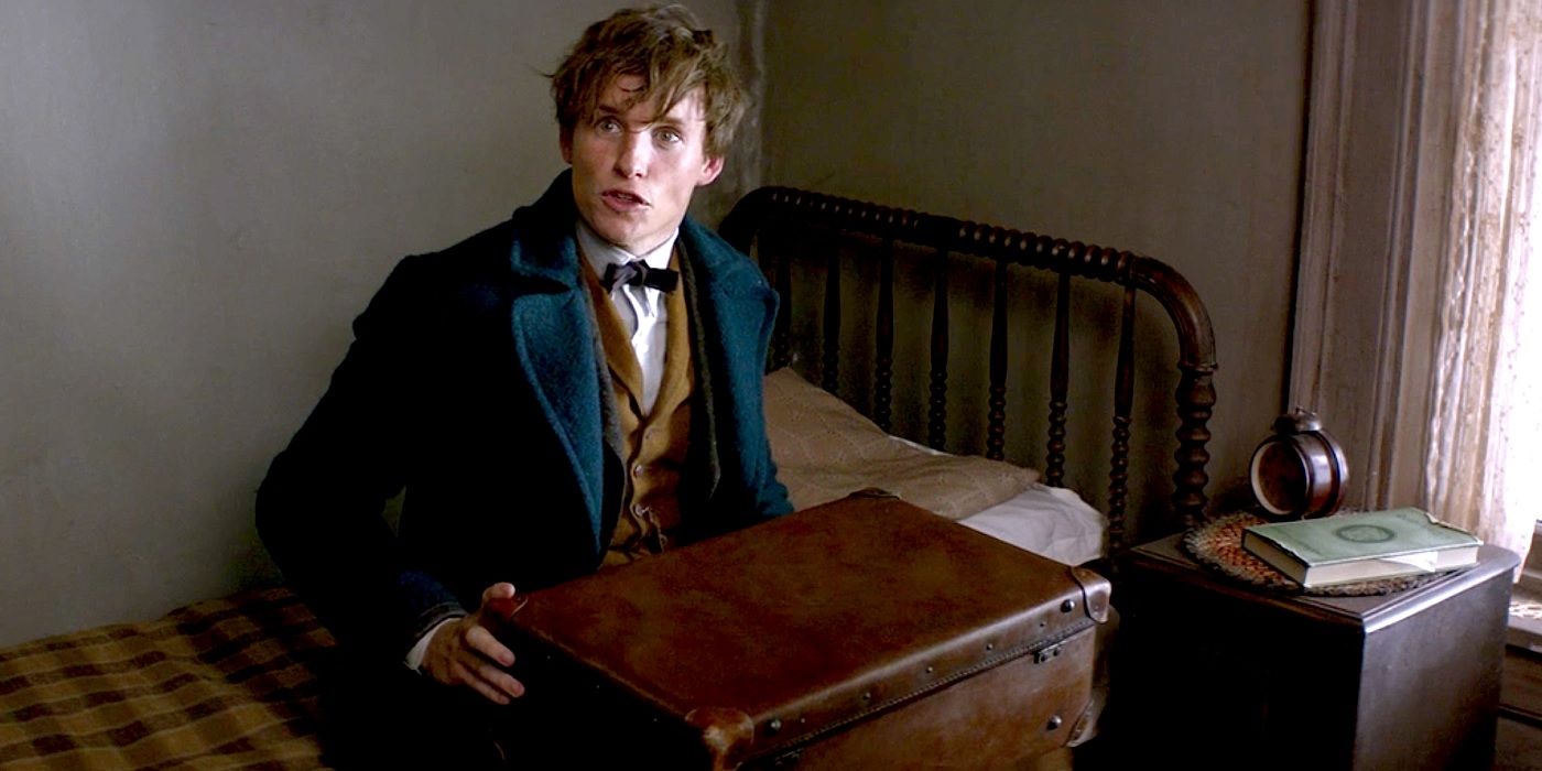 Newt Scamander holds a suitcase in Fantastic Beasts