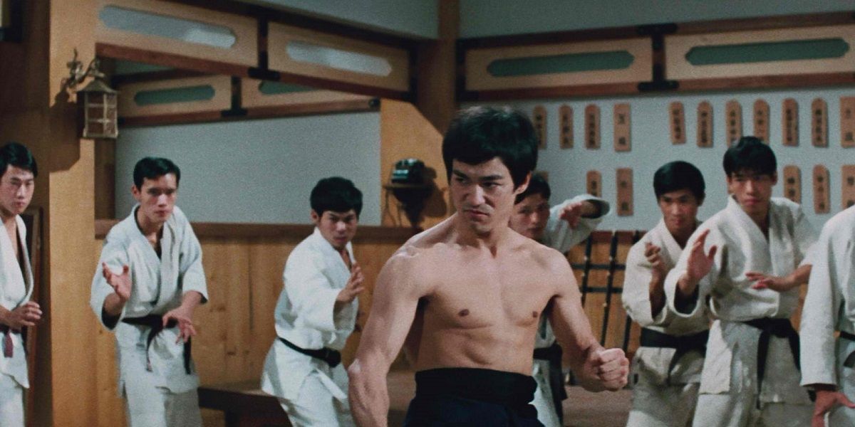 Bruce Lee surrounded by opponents in Fist of Fury