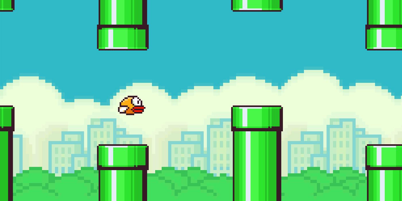 A screenshot of flappy bird flying between two green pipes