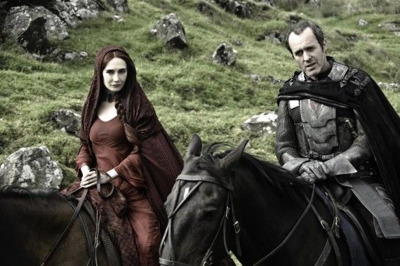 Melisandre and Stannis on horses in Game of Thrones