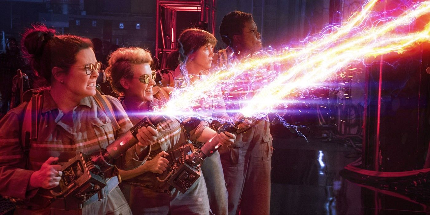 The Ghostbusters team firing their proton packs in Ghostbusters 2016