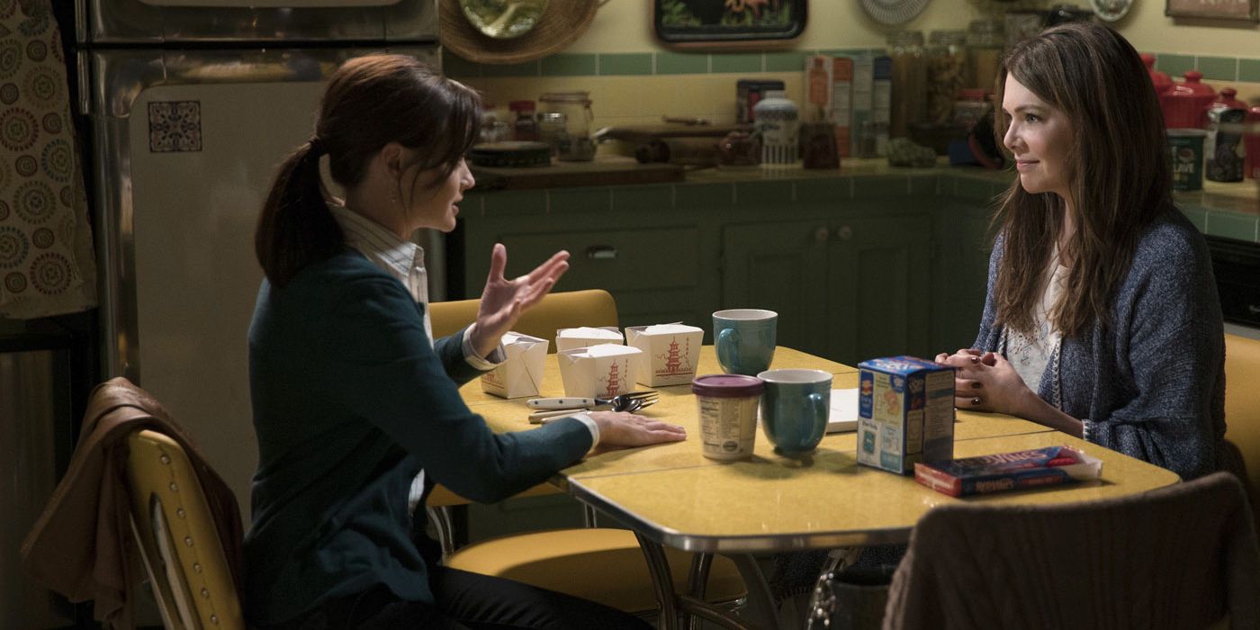 Rory and Lorelai sitting at the kitchen table in Lorelai's house on Gilmore Girls: A Year In The Life
